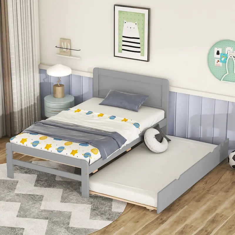 Lit plateforme bas gris de taille jumeau avec lit gigogne coulissant et tête de lit panneau
