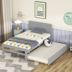Lit plateforme bas gris de taille jumeau avec lit gigogne coulissant et tête de lit panneau