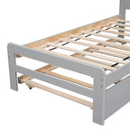 Lit plateforme bas gris de taille jumeau avec lit gigogne coulissant et tête de lit panneau