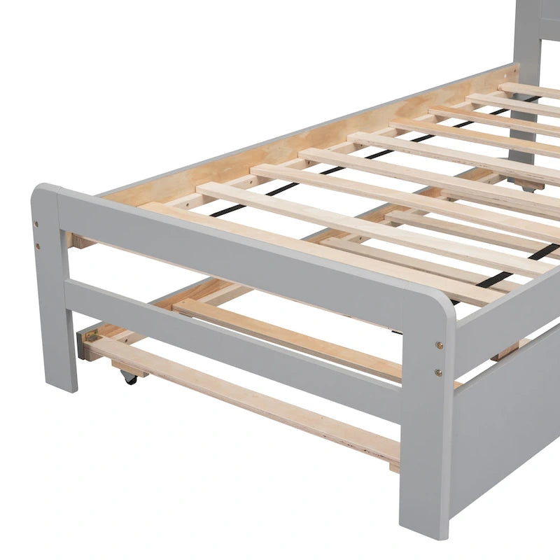 Lit plateforme bas gris de taille jumeau avec lit gigogne coulissant et tête de lit panneau