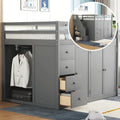 Lit mezzanine gris en pin massif de taille double avec armoire ouverte, unité à 4 tiroirs, armoire à deux portes et escalier de rangement côté droit.